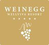 Logo del Wellviva Resort Weinegg con cinque stelle e simbolo dell'uva